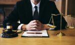 Judge gavel with Justice lawyers, Businessman in suit or lawyer working on a documents. Legal law, advice and justice concept